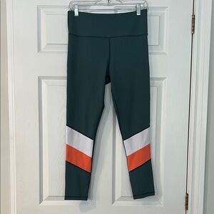 Zyia Active Dark Teal Leggings with Orange and White Accents